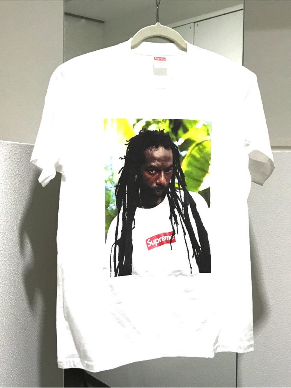 Supreme White Graphic Tee with Red Logo